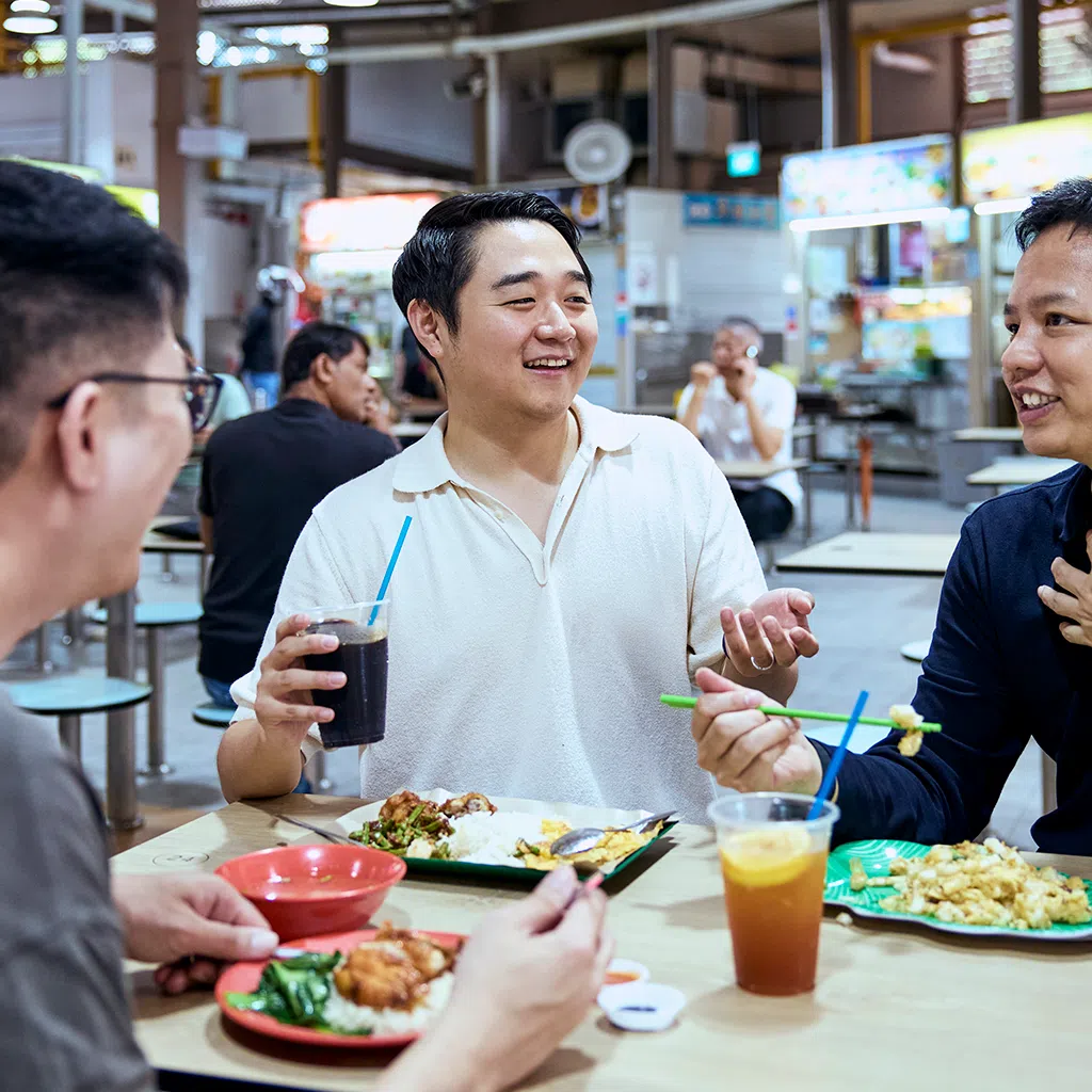 Gushcloud CFO Andrew Lim with two male colleagues.  