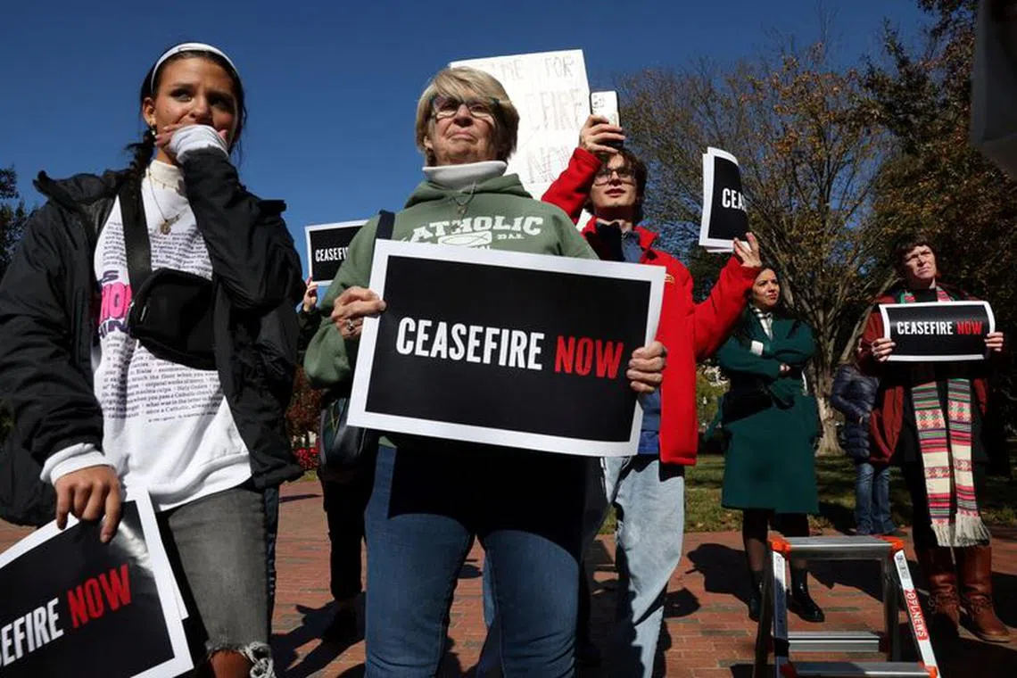 FILE PHOTO: People participate in a \"pray-in\", organized by the Franciscan Action Network, to call on U.S. President Joe Biden to support a ceasefire between Israel and the Palestinian group Hamas, amid the ongoing conflict between them, outside the White House in Washington, U.S., November 2, 2023. REUTERS/Leah Millis/File Photo