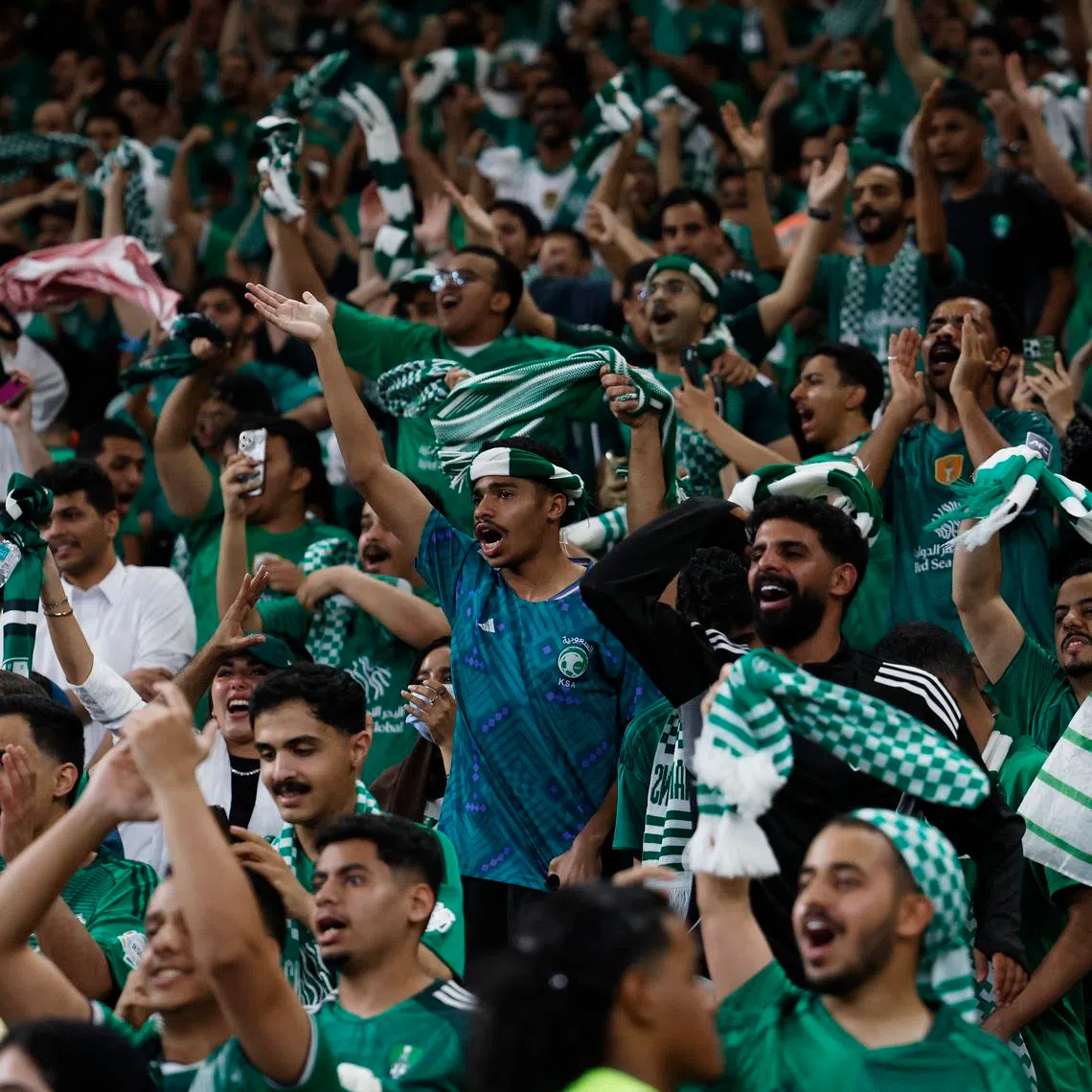 Soccer Football - Asian Champions League - Final - Al Ahli v Machida Zelvia - King Abdullah Sports City Stadium,  Jeddah, Saudi Arabia - April 25, 2026 Al Ahli fans celebrate after Feras Al-Brikan scores their first goal REUTERS/Ibraheem Abu Mustafa