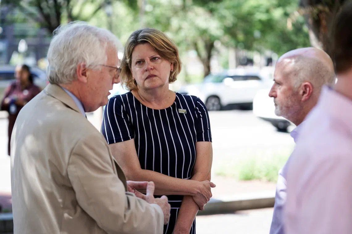 FILE PHOTO: Sally Buzbee, executive editor of the Washington Post, attends an unveiling of a #BringAustinHome\" banner, honoring freelance journalist Austin Tice, outside of the newspaper's headquarters in Washington, D.C., U.S., Aug. 9, 2022. Austin Tice was abducted in Syria on August 14, 2012. REUTERS/Sarah Silbiger/File Photo