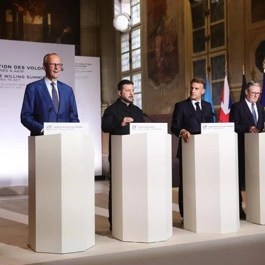 (From left) German Chancellor Friedrich Merz, Ukrainian President Volodymyr Zelensky, French President Emmanuel Macron, and British Prime Minister Keir Starmer at a press conference after the Coalition of the Willing summit on security guarantees for Ukraine in Paris, France.