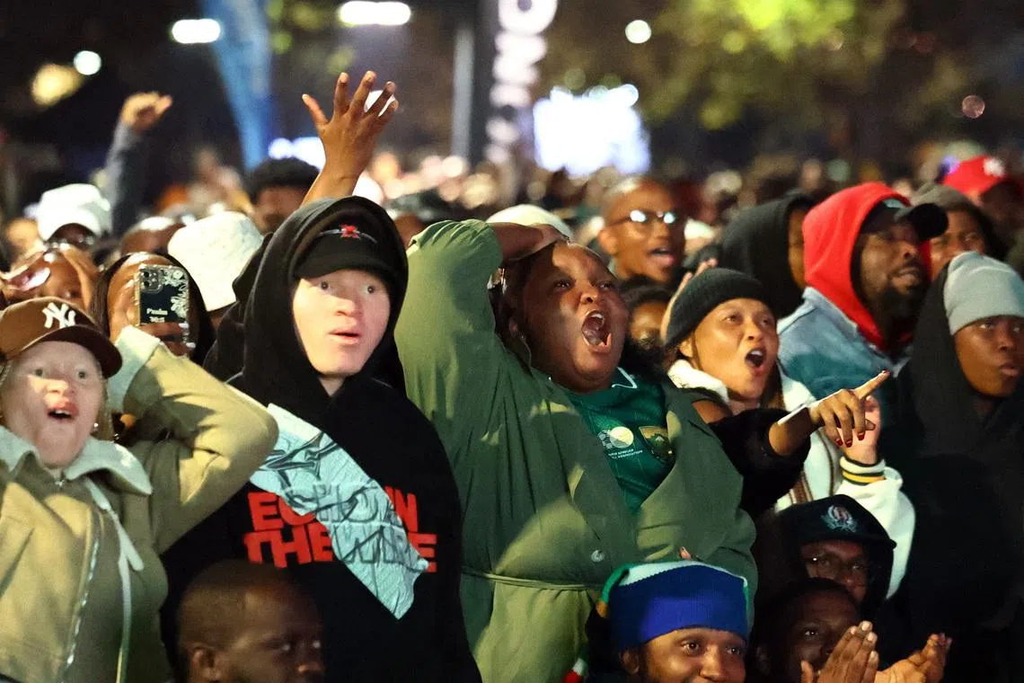 Soccer Football - FIFA World Cup 2026 - Mexico v South Africa - Fans gather in Johannesburg - The Mall of Africa, Midrand, Johannesburg, South Africa - June 11, 2026 South Africa fans react as they watch the match in Johannesburg REUTERS/Siphiwe Sibeko/File Photo