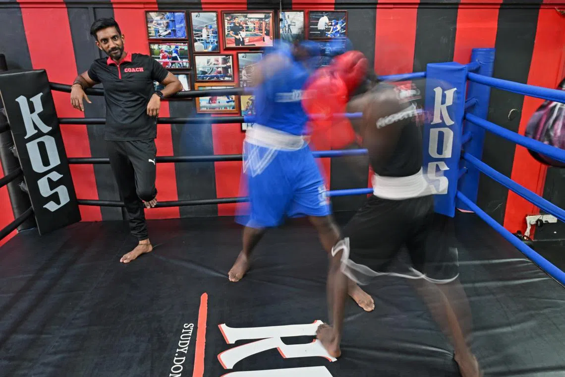 After beating cancer as a young teenager, Mr Kumar Perumal discovered his passion for boxing and started King of Strength boxing gym, which celebrates its 10th anniversary in 2024. ST PHOTO: Desmond Foo
