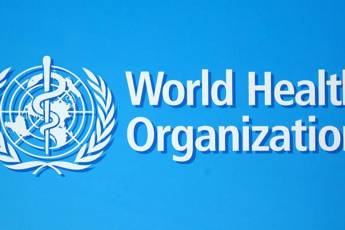 FILE PHOTO: A logo of the World Health Organization (WHO), is seen before a news conference in Geneva, Switzerland, June 25, 2020. REUTERS/Denis Balibouse/File Photo