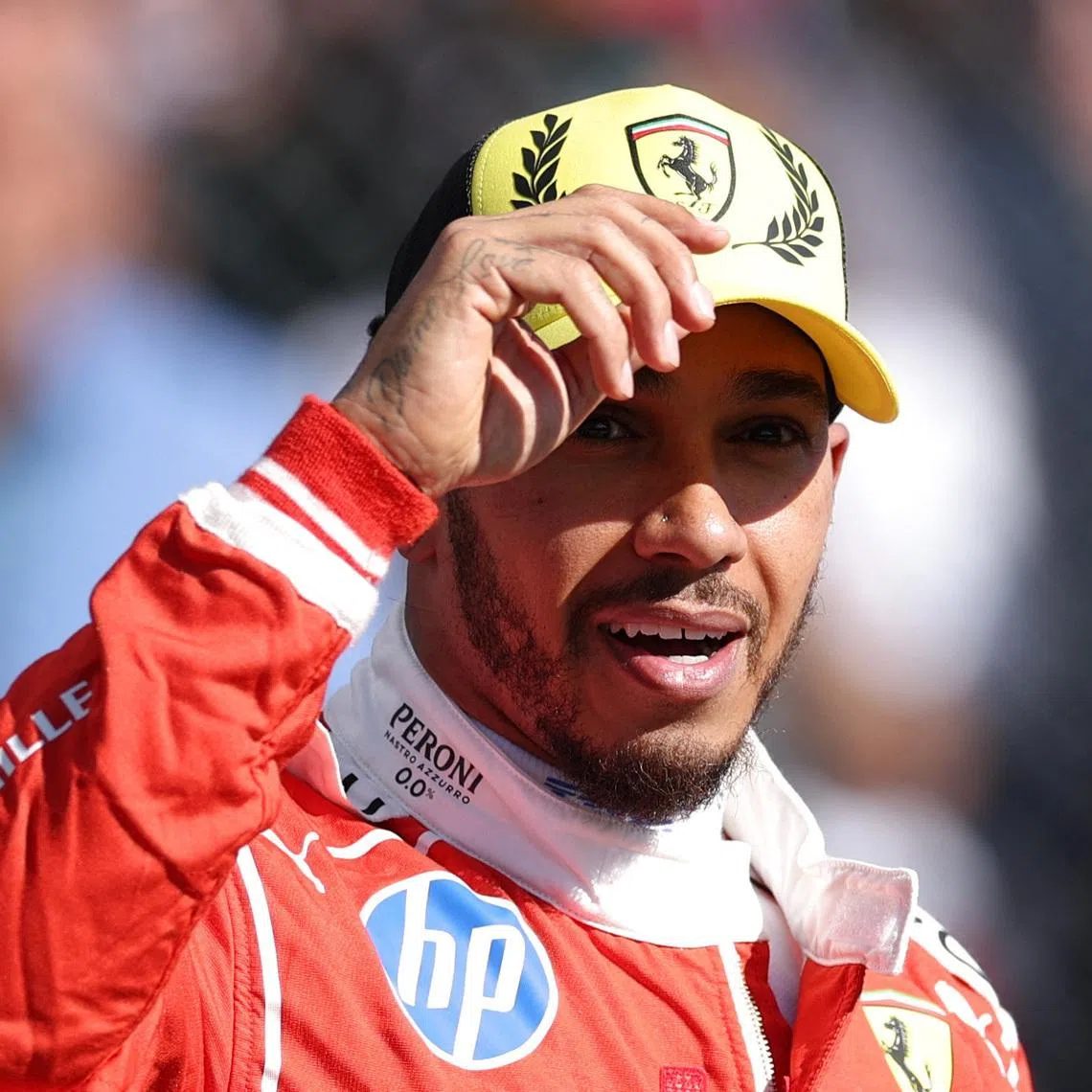 Formula One F1 - British Grand Prix - Silverstone Circuit, Silverstone, Britain - July 3, 2026 Ferrari's Lewis Hamilton celebrates after qualifying in pole position for the sprint race REUTERS/Andrew Boyers