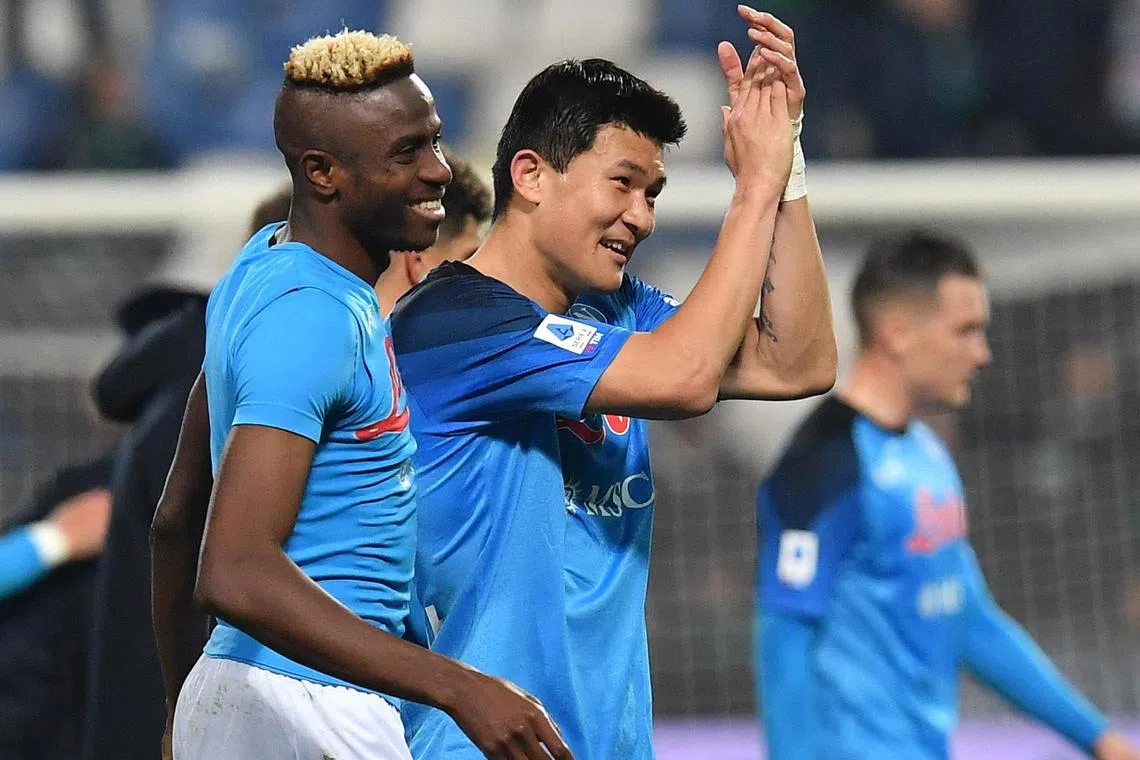 Napoli's Victor Osimhen (left) and Kim Min-Jae applauds fans after the match against U.S. Sassuolo in Italy, on Feb 17.
