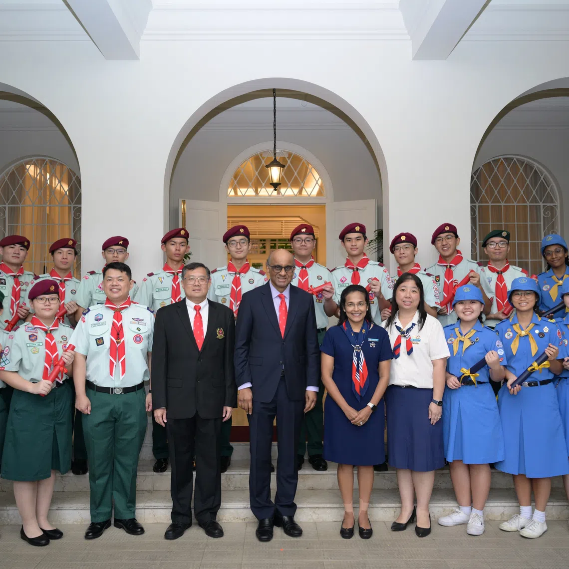 President Tharman Shanmugaratnam (front row, sixth from left) with recipients of the President’s Guide Award and President’s Scout Award at the Istana on Nov 13.