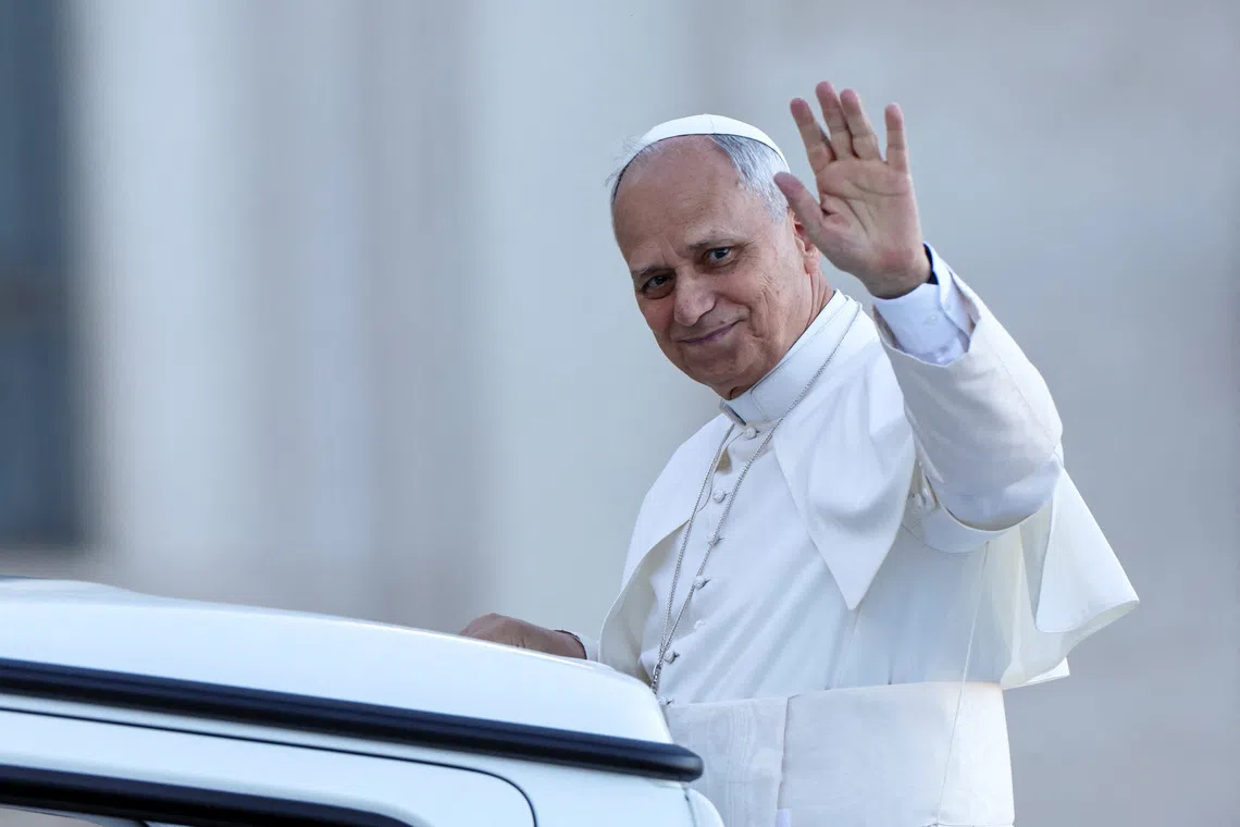 Pope Leo XIV waves from the Popemobile (Papamobile) ahead of a Holy Mass presided over by Metropolitan Archbishop of Zagreb Drazen Kutlesa, at the Vatican, October 7, 2025 REUTERS/Vincenzo Livieri