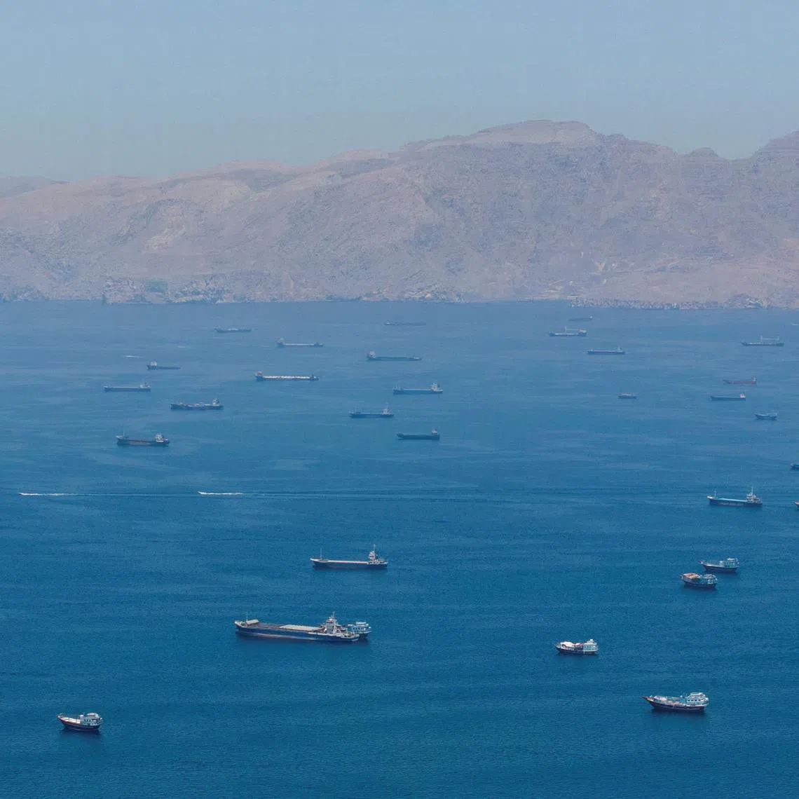 A drone view shows vessels anchored at the Strait of Hormuz, as seen from Musandam, Oman, May 25, 2026. REUTERS/Stringer/File Photo