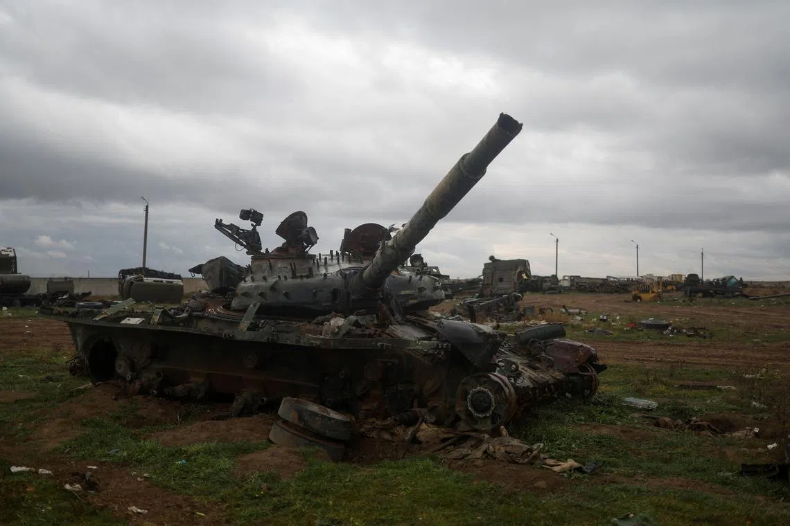 A destroyed Russian tank is seen  following Russia's retreat from Ukraine's Kherson, in November 2022.
