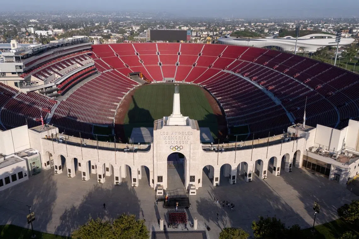 FILE PHOTO: A drone view of Los Angeles Coliseum, as it was announced it will host the opening ceremonies of the 2028 Olympics along with SoFi Stadium in a dual event, closing ceremony, and host the opening of the Paralympic Games in 2028, making it the first facility to host events for 3 Olympic Games in Los Angeles, California, U.S., May 8, 2025. REUTERS/Mike Blake/File Photo