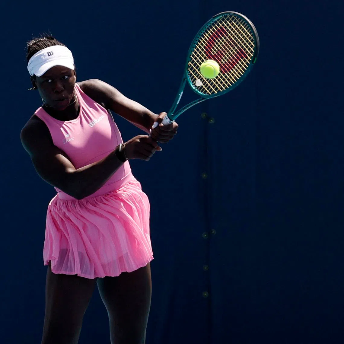 Mar 23, 2026; Miami Gardens, FL, USA; Victoria Mboko (CAN) hits a backhand against Mirra Andreeva (not pictured) on day 7 of the 2026 Miami Open at Hard Rock Stadium. Mandatory Credit: Geoff Burke-Imagn Images