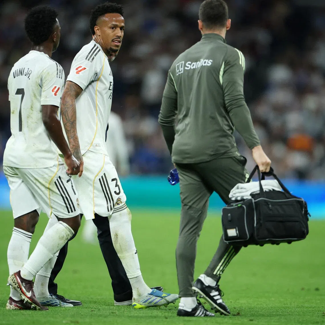 FILE PHOTO: Soccer Football - LaLiga - Real Madrid v Deportivo Alaves - Santiago Bernabeu, Madrid, Spain - April 21, 2026 Real Madrid's Eder Militao walks off to be substituted after sustaining an injury REUTERS/Isabel Infantes/File Photo