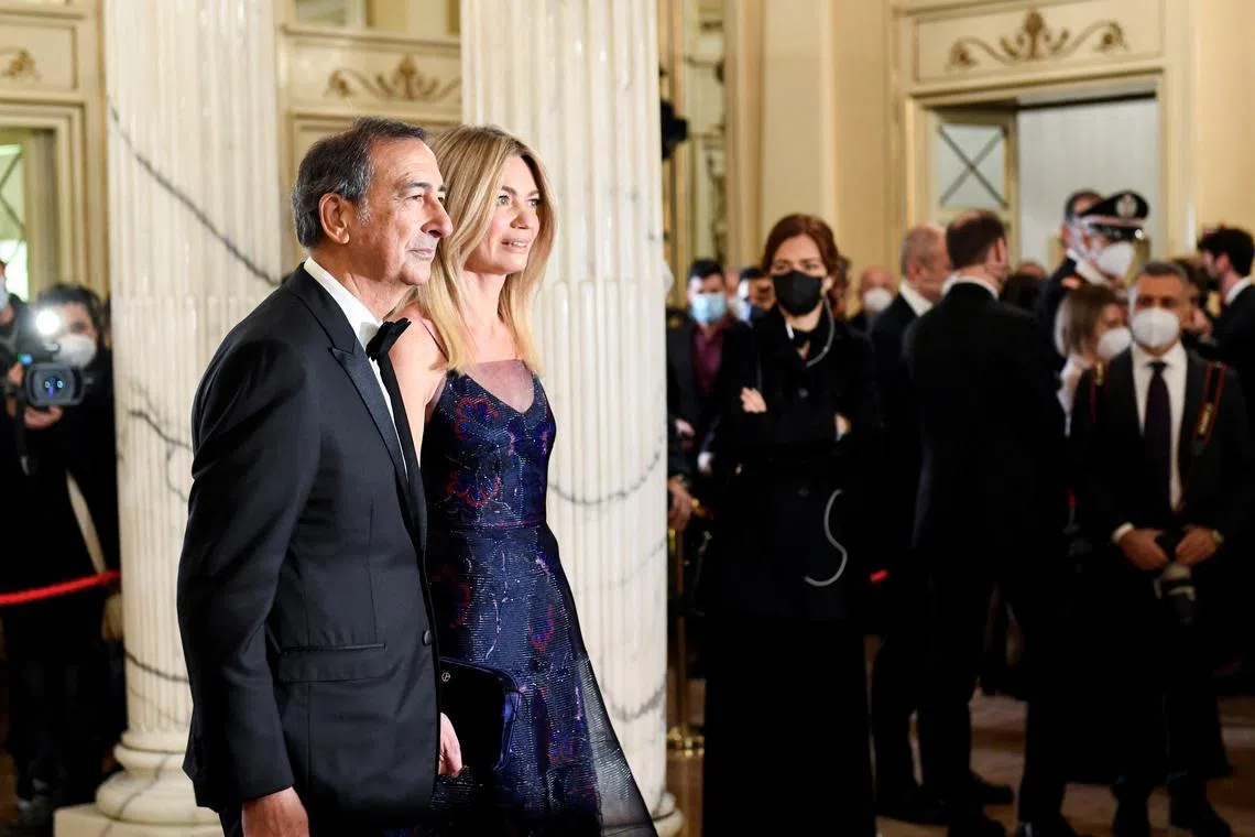 FILE PHOTO: Milan's Mayor Beppe Sala and his partner Chiara Bazoli arrive for the opening night of the La Scala opera house in Milan, Italy, December 7, 2021. REUTERS/Flavio Lo Scalzo/File Photo