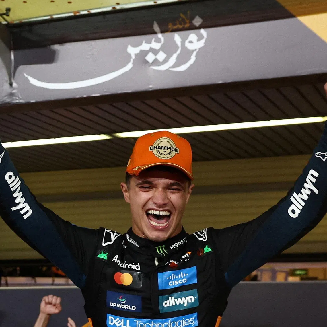 McLaren's Lando Norris celebrates after becoming the 2025 Formula One World Champion at the Yas Marina Circuit in Abu Dhabi on Dec 7, 2025.