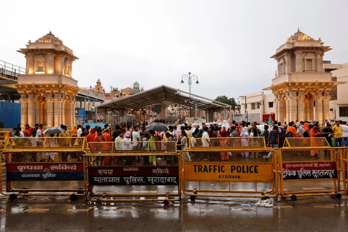 Hindu devotees wait to enter the Hindu god Lord Ram temple for prayers, in Ayodhya, in the northern state of Uttar Pradesh, India, June 6, 2024. REUTERS/Anushree Fadnavis