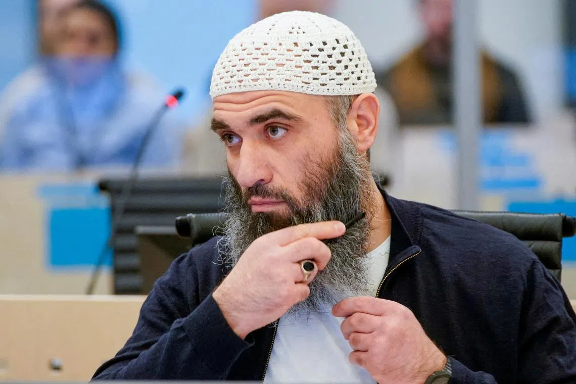 FILE PHOTO: Zaniar Matapour, charged with aggravated terrorism after he opened fire outside two bars, including the London pub in 2022, sits in courtroom 250 in Oslo Courthouse, Oslo, Norway, March 12, 2024.  NTB/Lise Aserud via REUTERS/File Photo