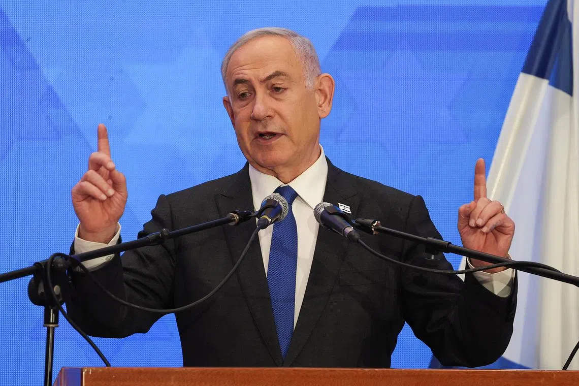 FILE PHOTO: Israeli Prime Minister Benjamin Netanyahu addresses the Conference of Presidents of Major American Jewish Organizations, amid the ongoing conflict between Israel and the Palestinian Islamist group Hamas, in Jerusalem, February 18, 2024. REUTERS/Ronen Zvulun/File Photo