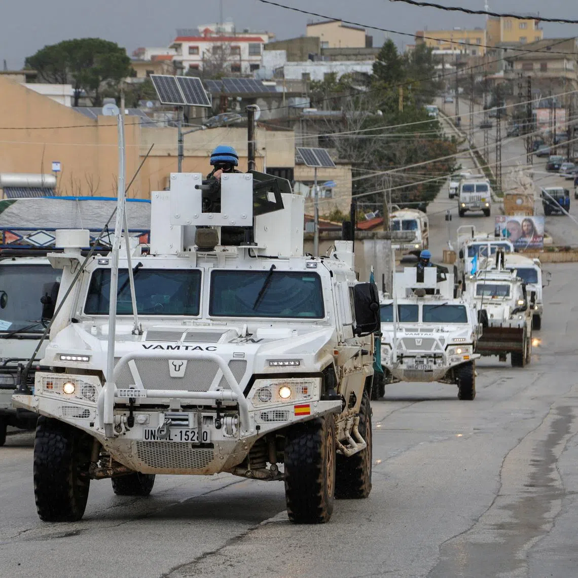 FILE PHOTO: UNIFIL vehicles drive on a main road in Qlayaa, amid escalating hostilities between Israel and Hezbollah, as the U.S.-Israel conflict with Iran continues, in Qlayaa, southern Lebanon, March 27, 2026. REUTERS/Karamallah Daher/File Photo
