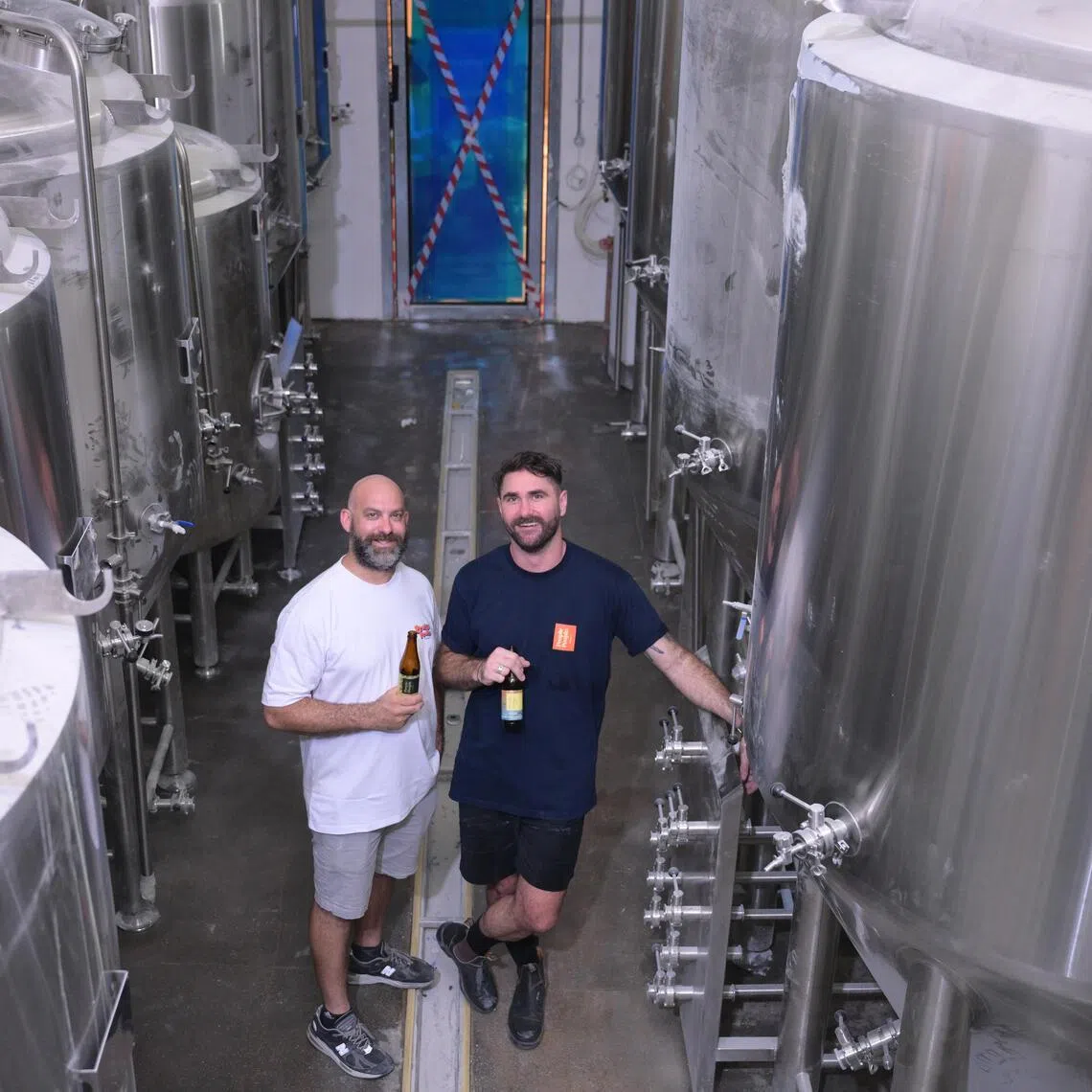 hybeer11/ST20260401_202614200541/Ng Sor Luan/Chef Dave Pynt (L) and brewer Nick Scholes at the site of People People Beer at Resorts World Sentosa on April 1, 2026.