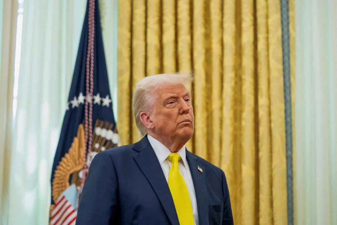 FILE PHOTO: U.S. President Donald Trump listens to remarks during a swearing-in ceremony for Administrator of the Centers for Medicare and Medicaid Services Mehmet Oz in the Oval Office in Washington, D.C., U.S., April 18, 2025. REUTERS/Nathan Howard/File Photo