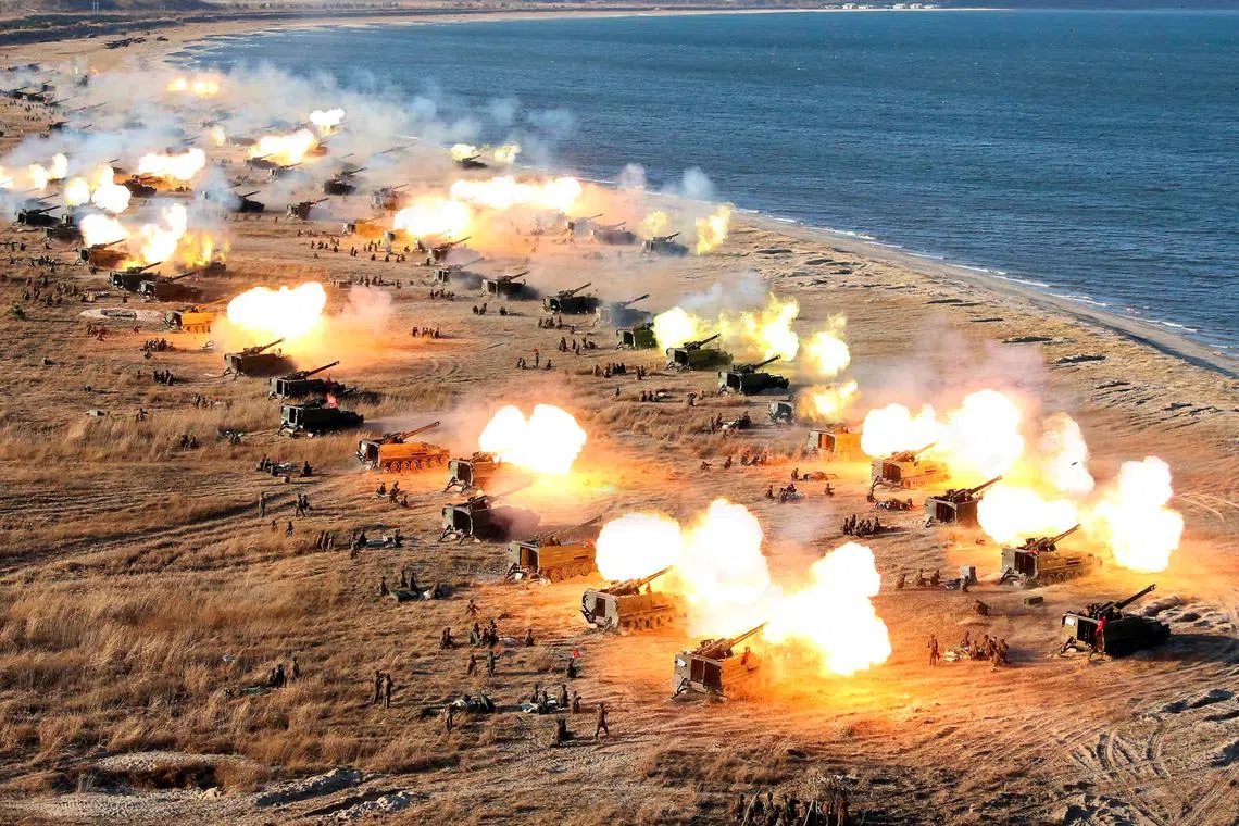 FILE PHOTO: A general view shows a drill by North Korean Korean People's Army (KPA) artillery units on the front in this image released by North Korea's Korean Central News Agency (KCNA) in Pyongyang December 2, 2016. 
