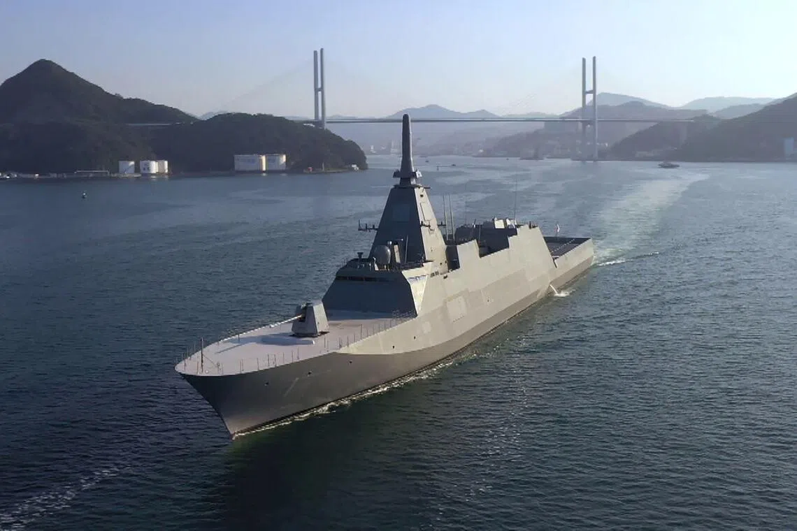 (FILES) This undated handout photo released by the Australian Defence Force on August 5, 2025 shows the Japanese Maritime Self-Defence Force (JMSDF) frigate JS Mogami (FFM-1) sailing in an undisclosed location. Long-pacifist Japan has shed its self-imposed ban on lethal weaponry exports, gunning for a prominent place in the global defence trade -- a challenging feat that analysts say could take years to achieve. (Photo by Handout / AUSTRALIAN DEFENCE FORCE / AFP) / RESTRICTED TO EDITORIAL USE - MANDATORY CREDIT "AFP PHOTO / AUSTRALIAN DEFENCE FORCE" - NO MARKETING - NO ADVERTISING CAMPAIGNS - DISTRIBUTED AS A SERVICE TO CLIENTS
To go with 'JAPAN-DEFENCE-TRADE, FOCUS' by Hiroshi Hiyama and Julien Girault