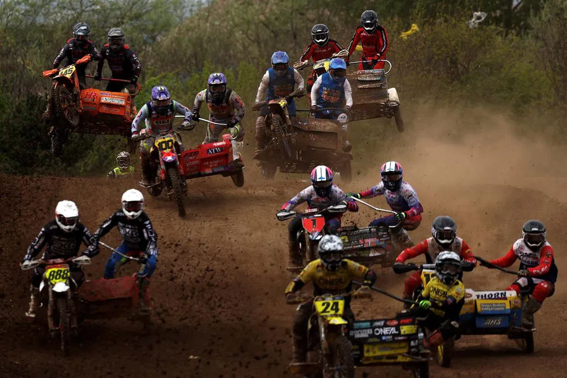 Riders competing during the NETT British Sidecar and Quad Bike Championships at the Iron Works Moto Park in Middlesbrough, Britain, April 14, 2024. 