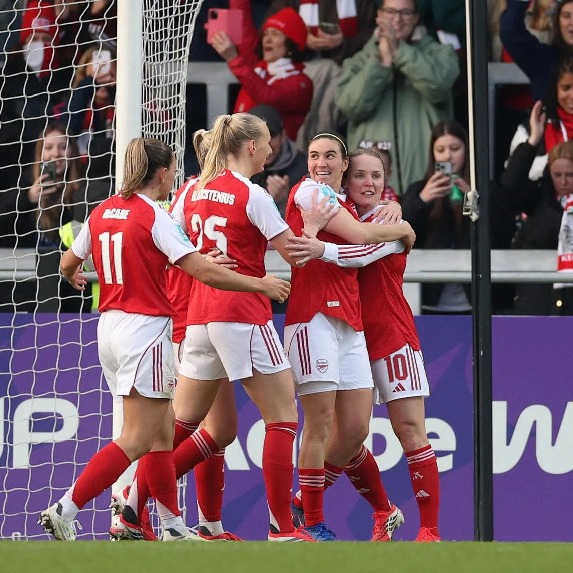FILE PHOTO: Soccer Football - Women's FA Cup - Fourth Round - Arsenal v Aston Villa - Meadow Park, Borehamwood, Britain - January 18, 2026 Arsenal's Stina Blackstenius celebrates scoring their first goal with teammates Action Images via Reuters/John Sibley/File Photo