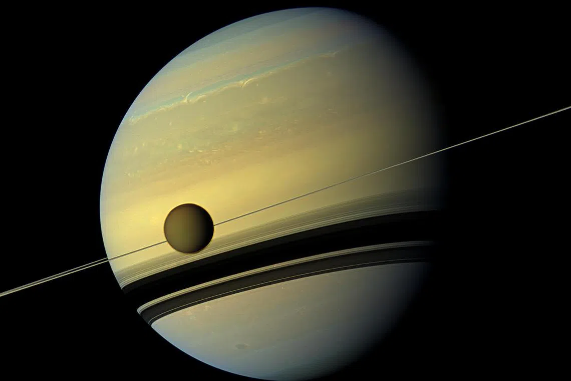 Titan, Saturn’s largest moon, is seen in this image provided by the Space Science Institute.