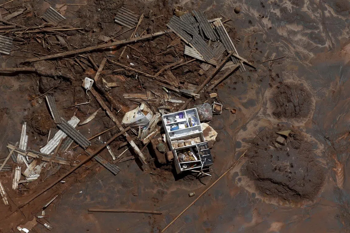 A cupboard is pictured in debris in Bento Rodrigues district, which was covered with mud after a dam owned by Vale SA and BHP Billiton Ltd burst, in Mariana, Brazil, November 10, 2015. REUTERS/Ricardo Moraes/File Photo