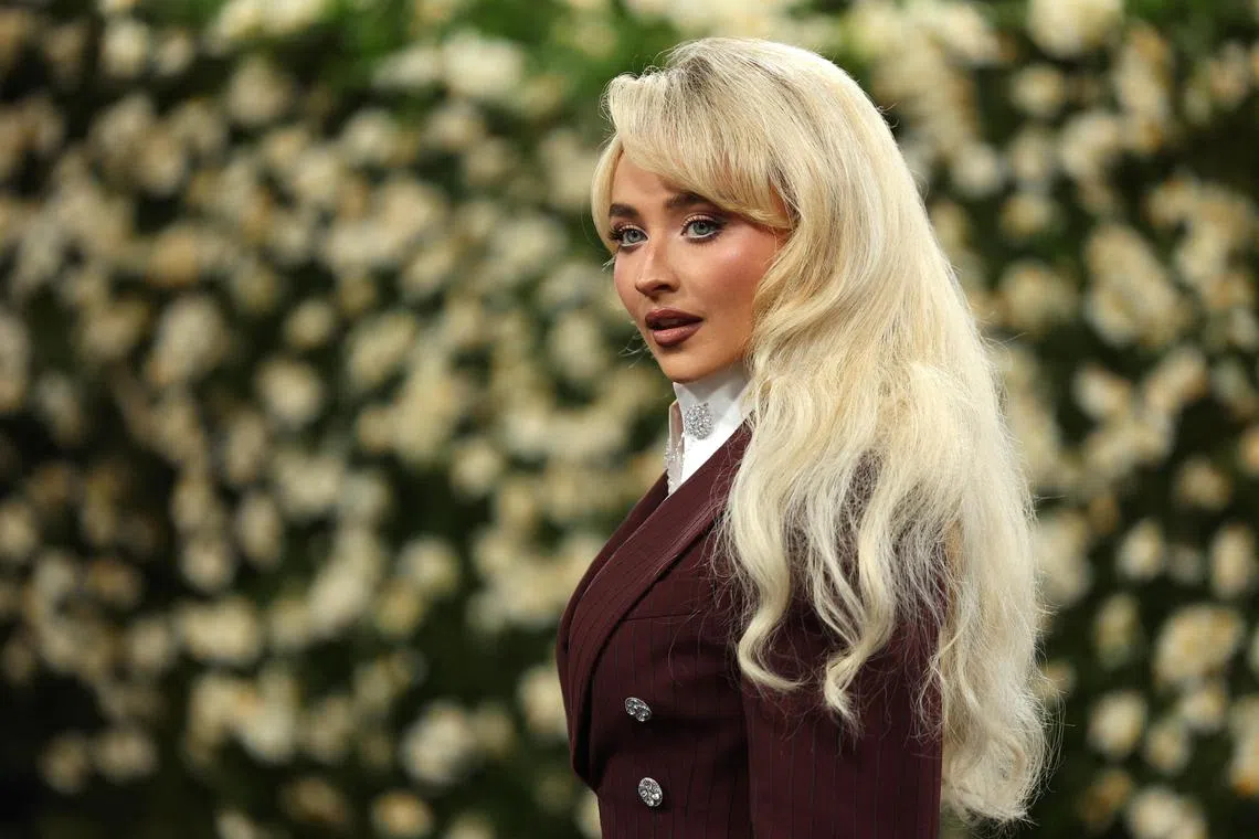 Sabrina Carpenter, seen here at the Met Gala,  gets cheeky in new single Manchild.