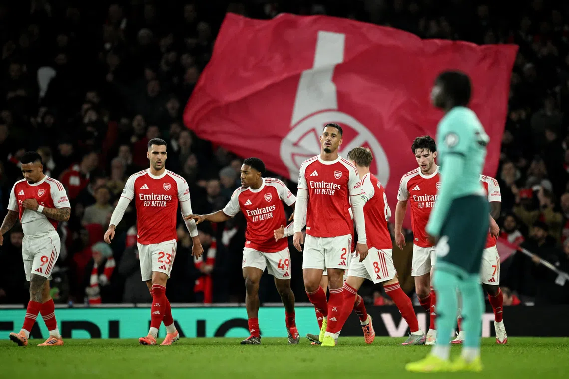 Arsenal need two own goals to scrape win against rock-bottom Wolves