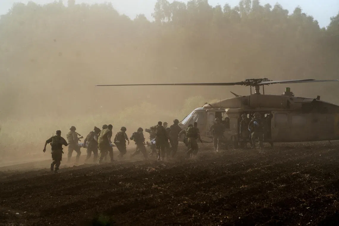 FILE PHOTO: Israel's military evacuate injured people by helicopter after an anti-tank missile was fired into Israel from Lebanon, amid cross-border hostilities between Hezbollah and Israel, near Israel's border with Lebanon in northern Israel September 19, 2024. REUTERS/Ayal Margolin/File Photo