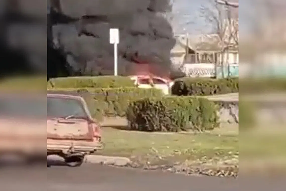 Unverified video footage of the alleged attack posted online showed thick grey smoke and flames rising into the air above a car.