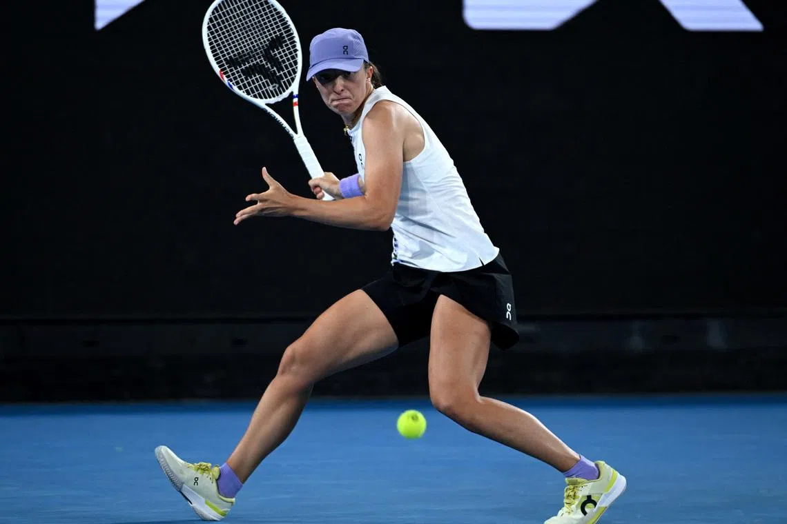 Tennis - Australian Open - Melbourne Park, Melbourne, Australia - January 24, 2026 Poland's Iga Swiatek in action during her third round match against Russia's Anna Kalinskaya REUTERS/Jaimi Joy