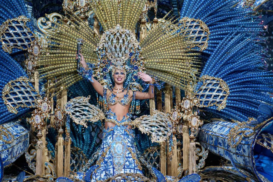Adriana Pena Fumero, with the fantasy 'Lisboa', reacts after being proclaimed the new Queen of Santa Cruz de Tenerife's Carnival during the gala held in Tenerife, Canary Islands, Spain, Feb 15, 2023.  

The Santa Cruz de Tenerife Carnival is the most “Brazilian” of all the Spanish carnivals, and it is famous all over the world for its popular flavour. For fifteen days, the streets of the city come alive with joie de vivre, freedom and extravagance.