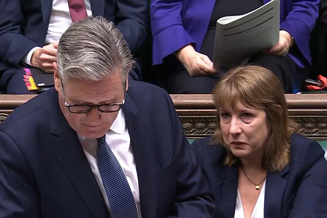 A video grab shows Britain's Chancellor of the Exchequer Rachel Reeves looking tearful during a weekly questions session in Britain's Parliament with Prime Minister Keir Starmer.