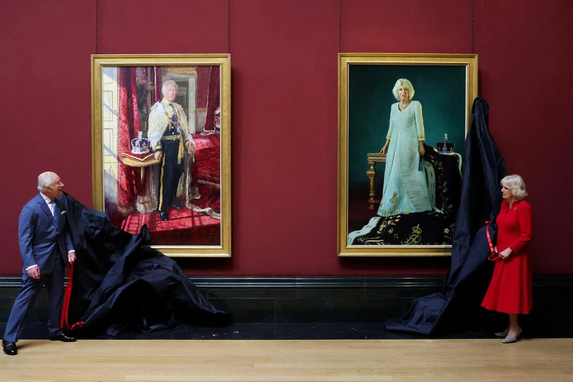 Britain's King Charles and Queen Camilla unveiling their official Coronation State Portraits during a visit to the National Gallery, in London, Britain, on May 6, 2025. 