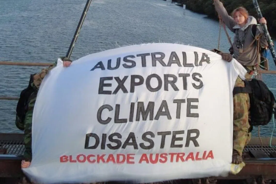 A 22-year-old woman was arrested at the scene after law enforcement removed the structure from the tracks. 