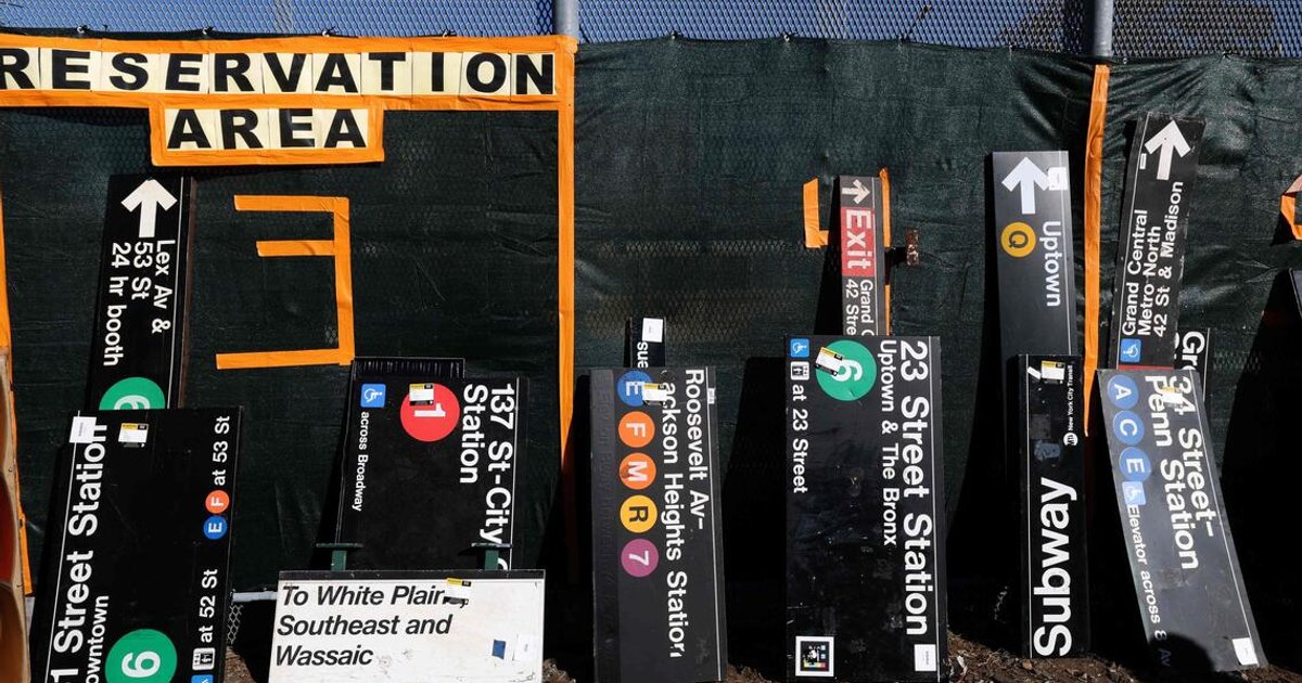 New Yorkers snap up discarded subway signs, seats at annual sale