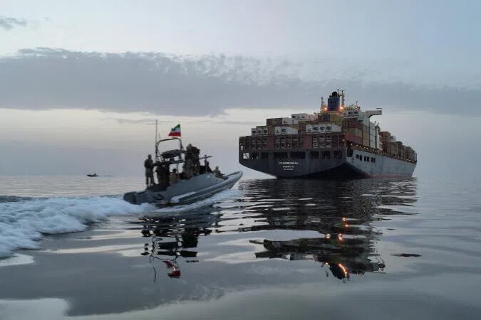 Iran's Islamic Revolutionary Guard Corps seen seizing a ship in the Strait of Hormuz in an image obtained on April 24, 2026.