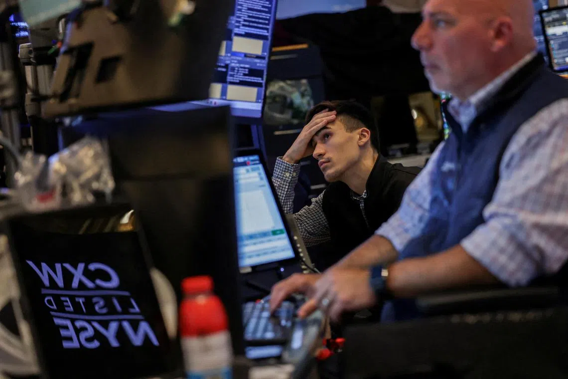 Traders working on the floor of the New York Stock Exchange, in New York City, on July 8.    