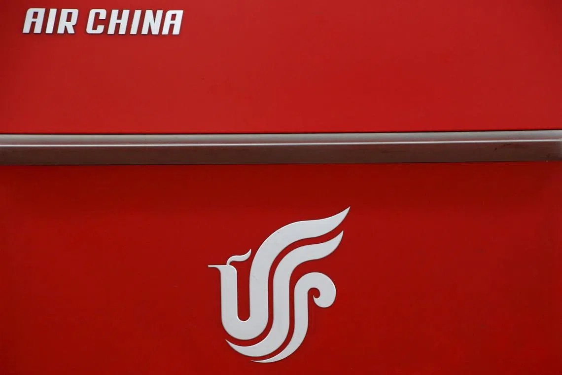 FILE PHOTO: Air China's logo is seen on a counter of Air China at a terminal of Beijing Capital International Airport in Beijing, China, March 28, 2016.REUTERS/Kim Kyung-Hoon/File Photo