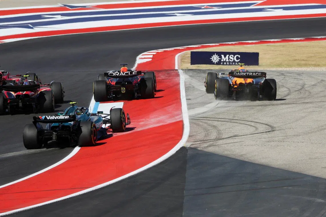 Red Bull's Max Verstappen (left) and McLaren's Lando Norris in action during the US grand prix in Austin, Texas