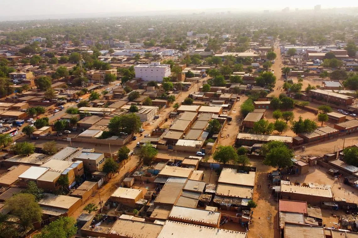 A drone picture shows a suburb following the attack on the international airport in Niamey, Niger January 30, 2026. REUTERS/ Mahamadou Hamidou