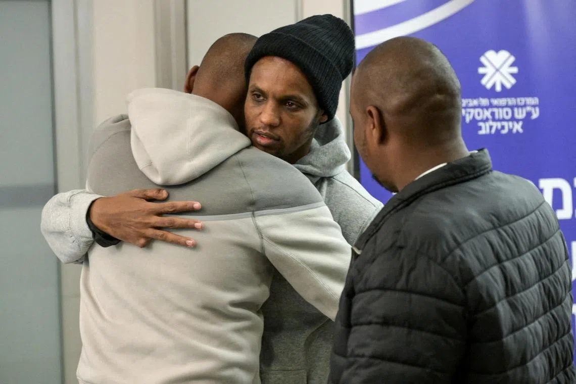 Avera Mengistu, who entered Gaza around a decade ago and was held there since, reacts during the reunion with his family, after he was released as part of hostages-prisoners swap and a ceasefire deal between Hamas and Israel, at Ichilov Hospital, in Tel Aviv, Israel February 22, 2025.     Maayan Toaf/GPO/Handout via REUTERS