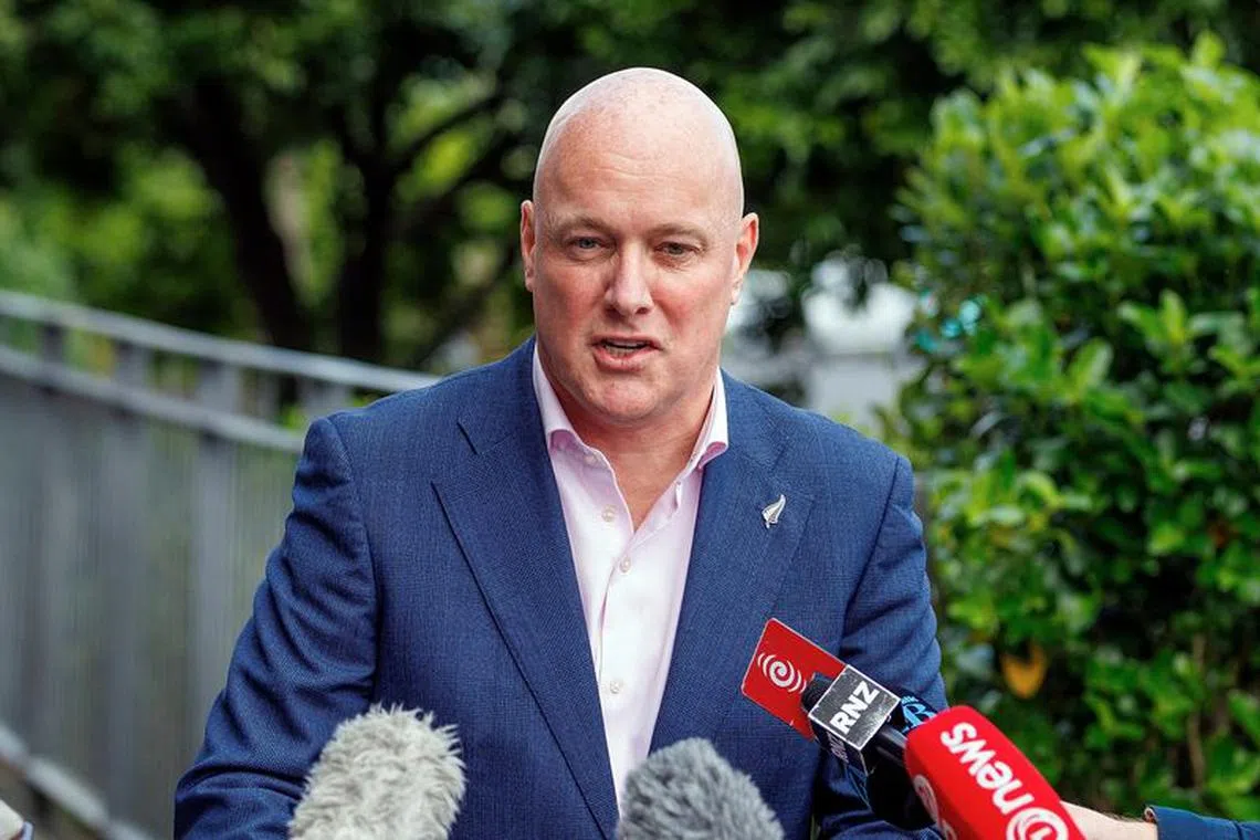 Christopher Luxon, leader of the New Zealand National Party, holds a media conference after casting his vote in the general election in Auckland, New Zealand, October 2, 2023. REUTERS/David Rowland/File Photo