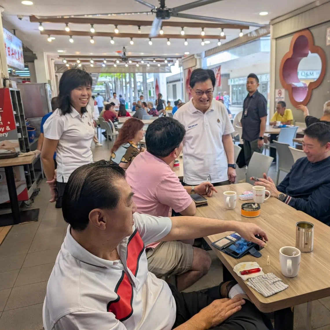 DPM Heng Swee Keat at a morning walkabout at Simei Plaza on March 15.