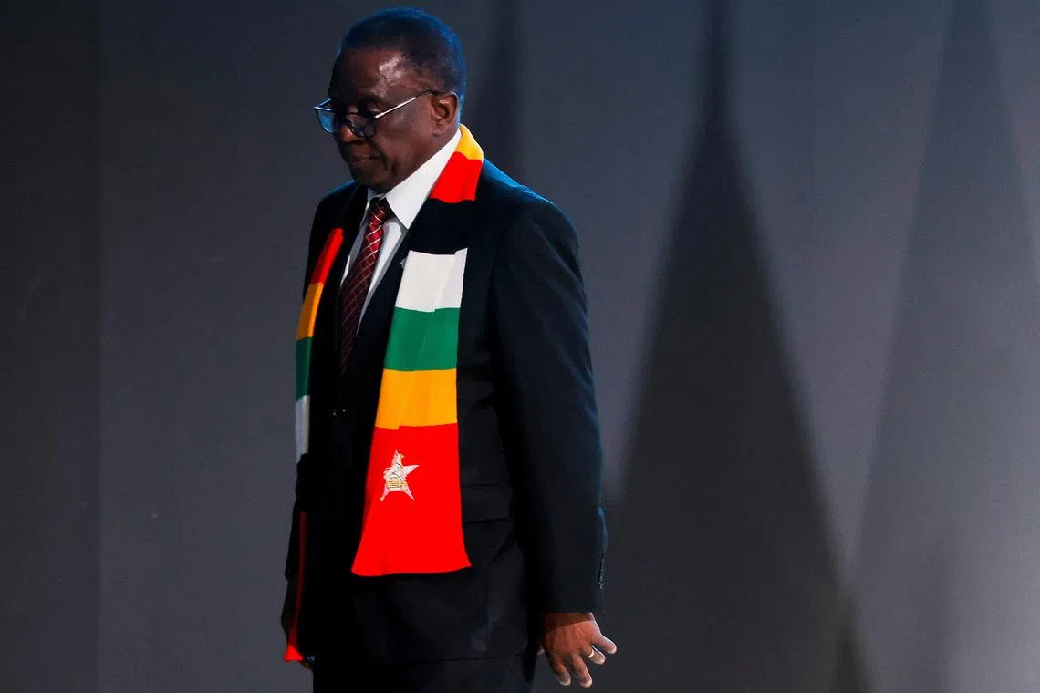 Zimbabwe's President Emmerson Mnangagwa walks on stage during the United Nations climate change conference COP29, in Baku, Azerbaijan November 2024. REUTERS/Maxim Shemetov